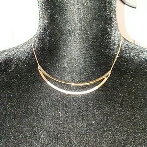 Gold and white necklace